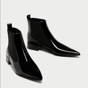 pointed toe flat ankle boots